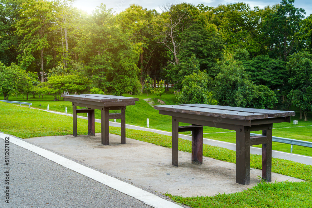 Two chairs on green grass at Park,vivid tone in nature forest Mountain views spring cloudy sky background with white cloud. Two chairs on green grass at Park,vivid tone in nature forest Mountain views spring cloudy sky background with white cloud.