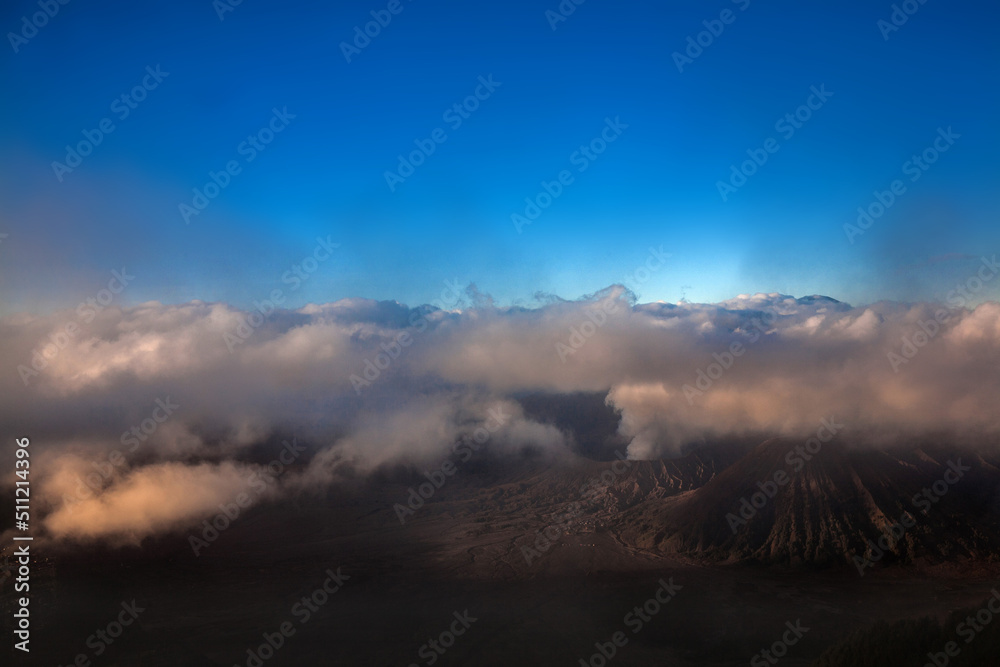 Fototapeta premium Bromo Mountain with Morning Mist, is Volcano Mountain in Surabaya, Indonesia