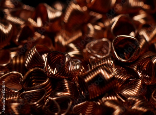 close-up of red copper spirals with sparkles