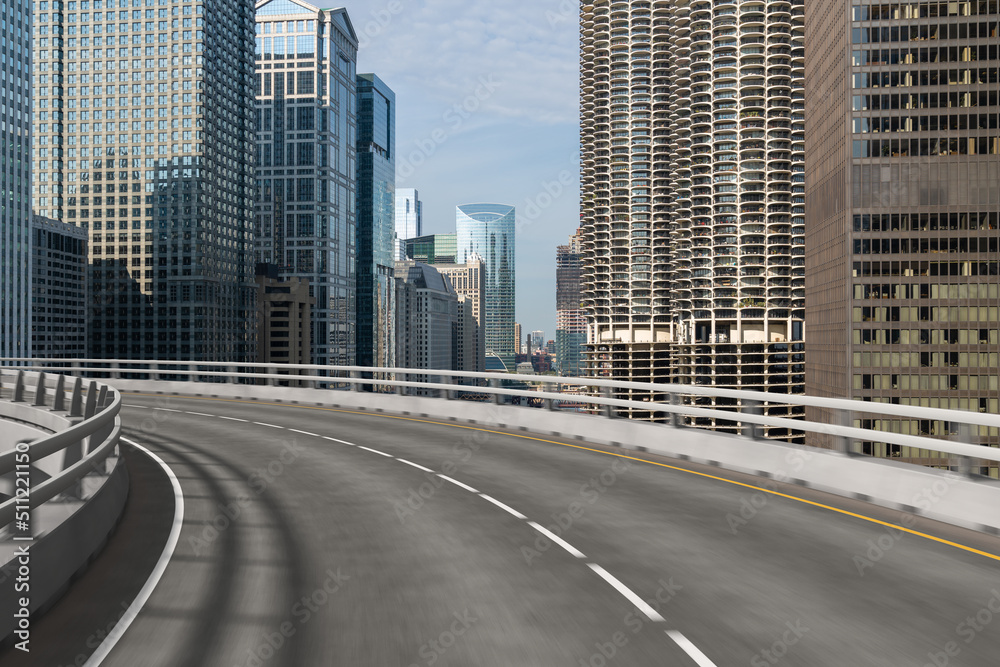 Obraz premium Empty urban asphalt road exterior with city buildings background. New modern highway concrete construction. Concept of way to success. Transportation logistic industry fast delivery. Chicago. USA.