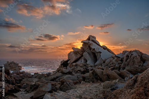 Panoramic landscape view with dramatic sunset on rocky coast, Santa teresa di Gallura, sunset at Capo Testa, Sardinia