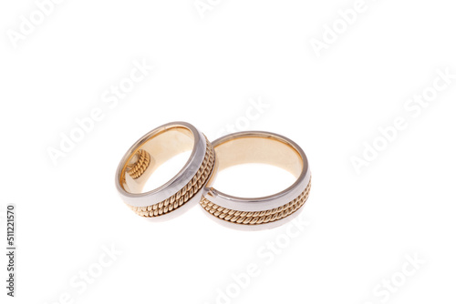 Golden wedding rings, isolated on white