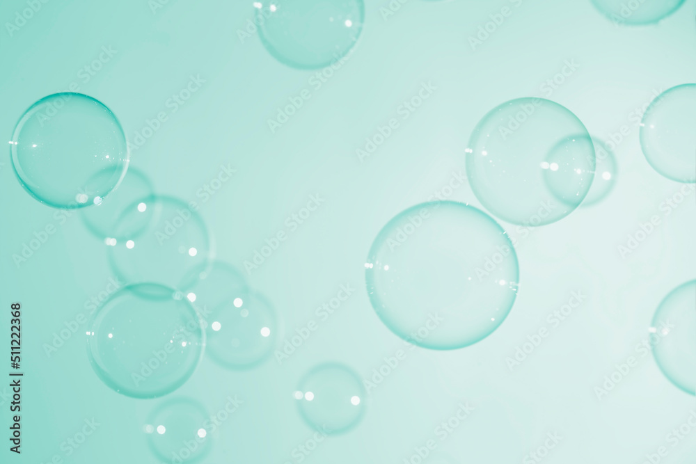 Abstract Transparent Green Soap Bubbles Background. Soap Sud Bubbles Water.