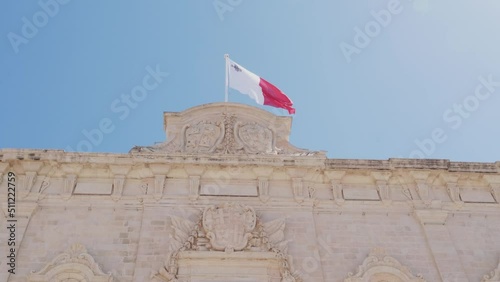 Maltese Flag on top of the office of the prime minister of Malta called Il-Berġa ta' Kastilja photo