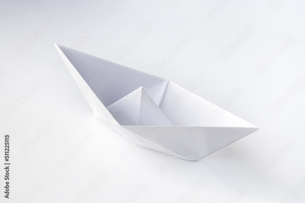 Paper boat origami isolated on a white background Paper boat origami isolated on a white background