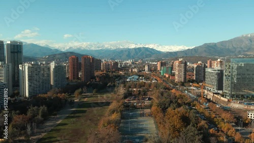 Large And Beautiful City Park In Las Condes Locale With Extensive Scenery Of Contemporary Office Buildings In Santiago, Chile. Aerial Forward Shot photo