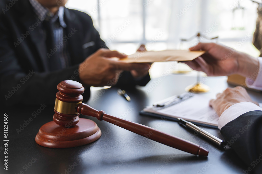 lawyer or judge is taking a bribe. In the client's courtroom at the lawyer's office In order to bribe to gain an advantage in the form of lawsuits, the concept of bribery and corruption in law lawyer or judge is taking a bribe. In the client's courtroom at the lawyer's office In order to bribe to gain an advantage in the form of lawsuits, the concept of bribery and corruption in law
