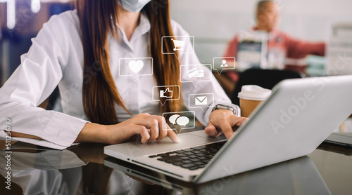 Women use the keyboard for laptops for mobile payments Omni channel online shopping. photo