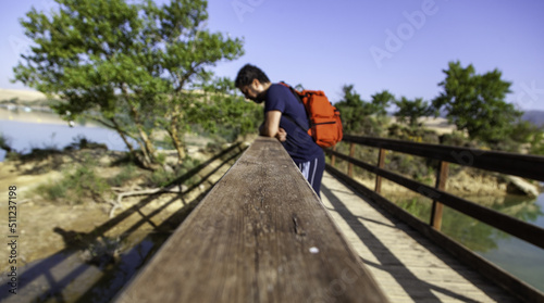 Man leaning on a railing