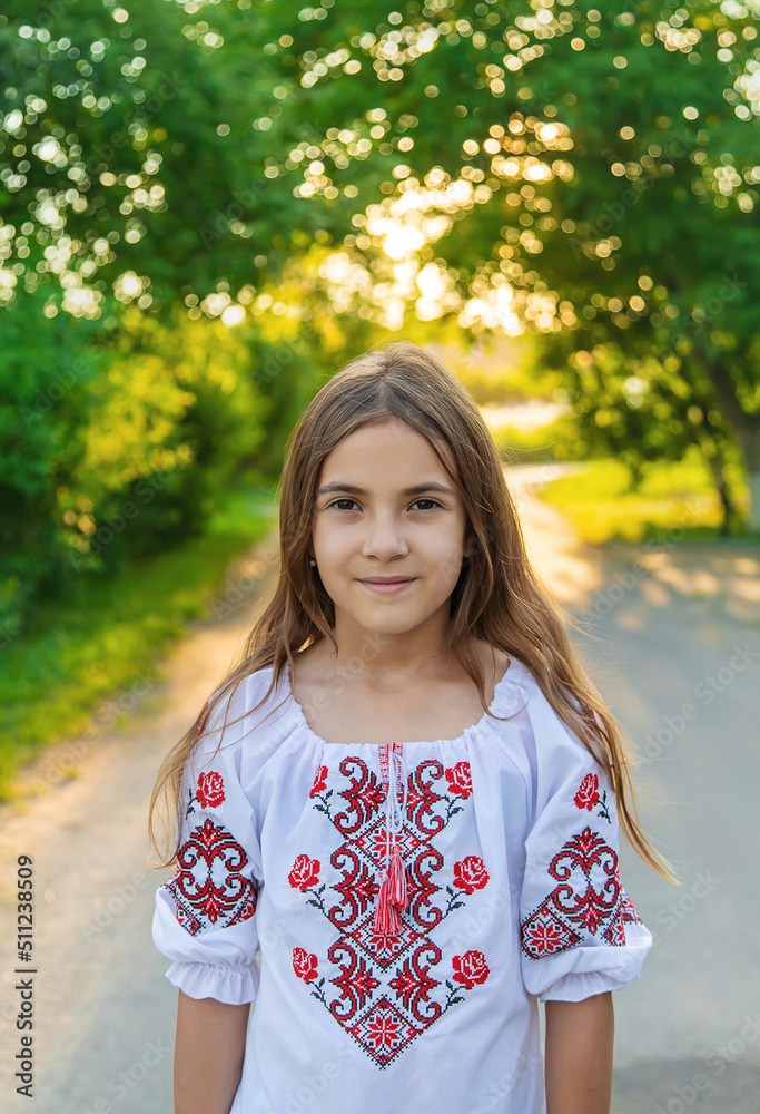 Ukrainian girl child in vyshyvanka. Selective focus. Ukrainian girl child in vyshyvanka. Selective focus.