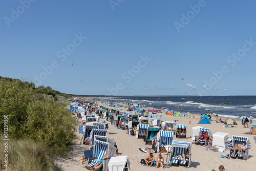 Fototapeta Naklejka Na Ścianę i Meble -  The view of the beach of Zempin on the island of Usedom with many beach chairs
