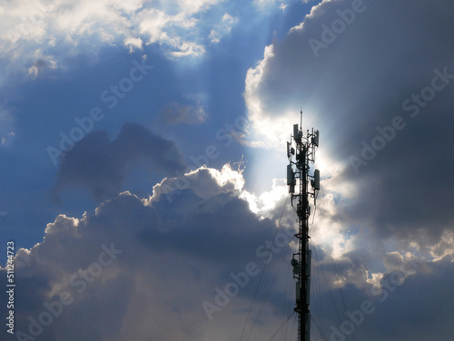 Signal pole on sky background. Signal pole with god light sky.