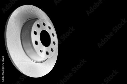 Car brake disc isolated on black background. Auto spare parts. Perforated brake disc rotor isolated on black. Braking ventilated discs. Quality spare parts for car service or maintenance