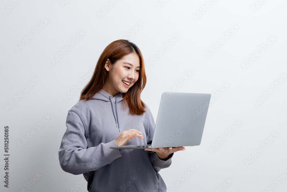 Beautiful Asian woman gesturing for advertisement editing on isolated background, portrait concept used for advertisement and signage, isolated over white background, copy space.