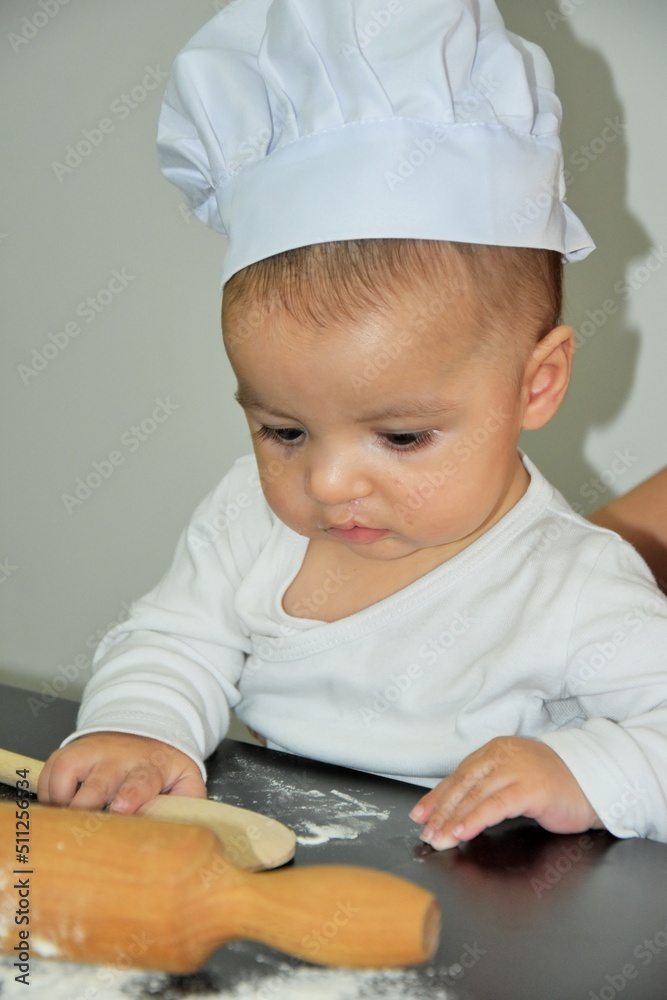 baby chef in kitchen baby chef in kitchen
