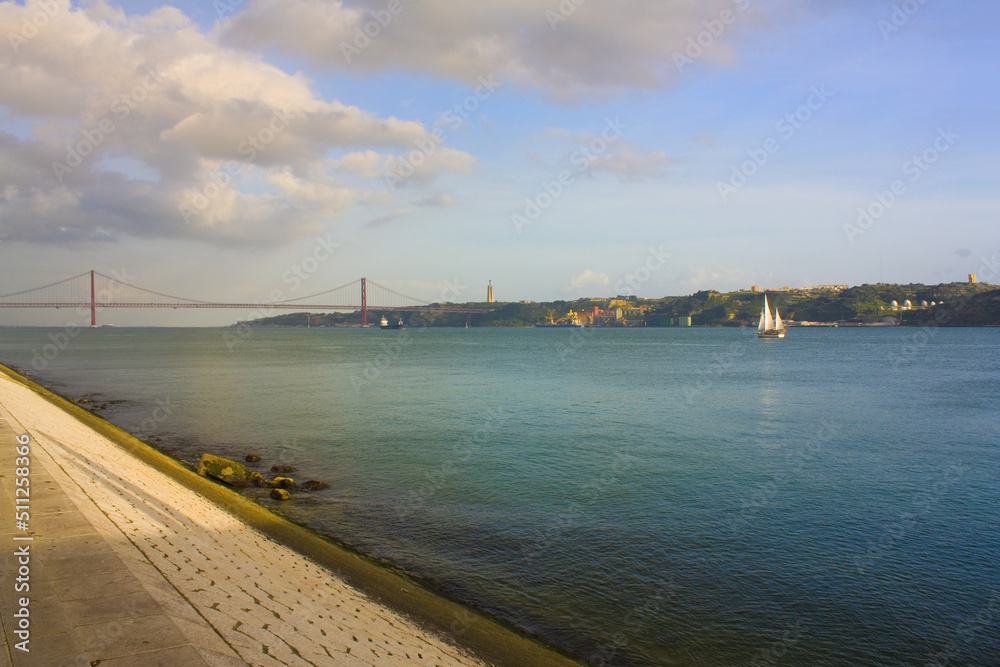 Tagus river bank with 25th April bridge in Lisbon