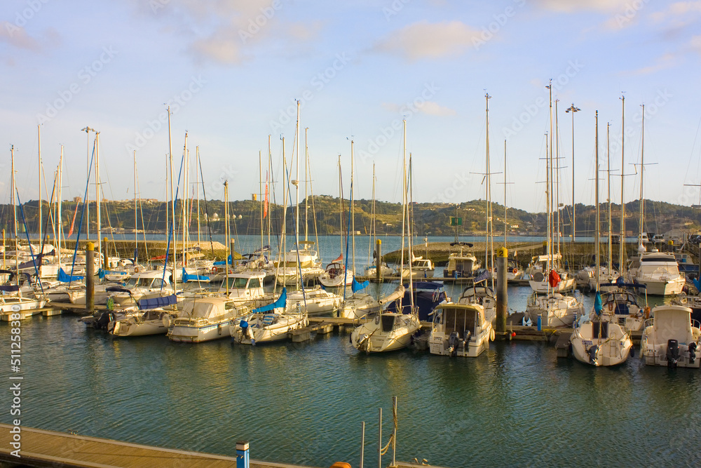 Yachts at rest at Doca de Belem Harbour in the city centre of Lisbon in Portugal 