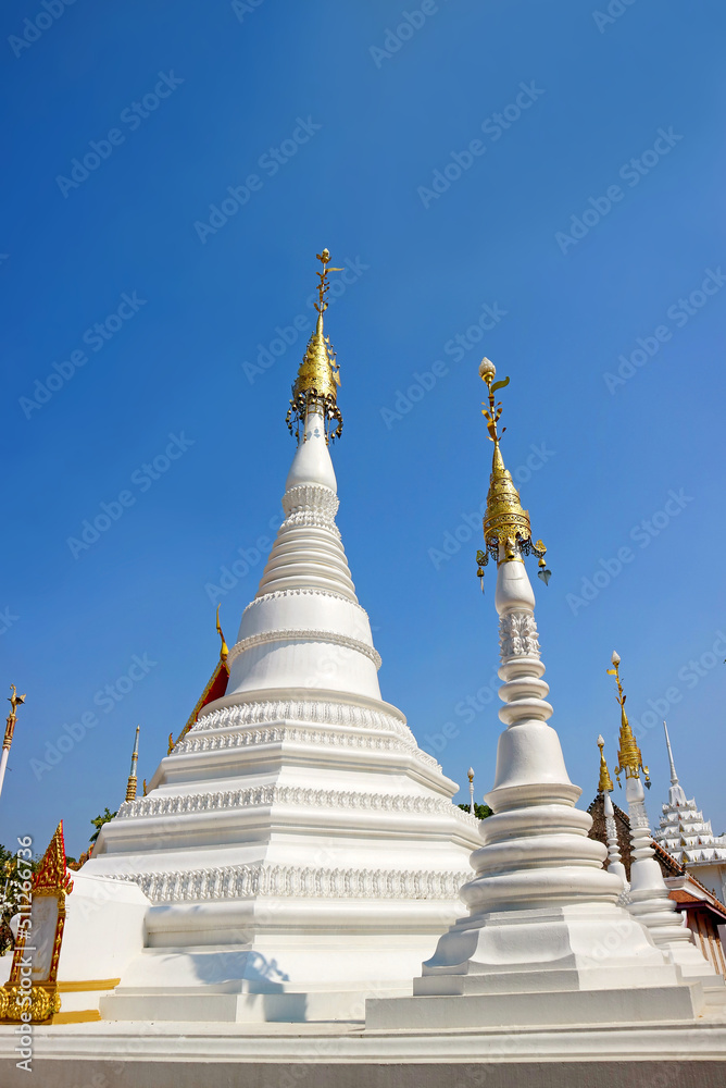 Group of Gorgeous Mon Style Pagoda or Phra Mu Tao in Wat Chomphuwek Historic Buddhist Temple, Nonthaburi Province, Thailand
