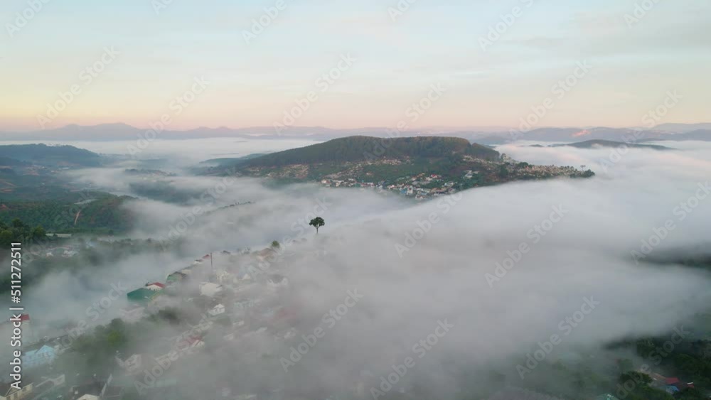 Aerial view of the town in the early morning mist is beautiful in the highlands of Da Lat, Vietnam Aerial view of the town in the early morning mist is beautiful in the highlands of Da Lat, Vietnam