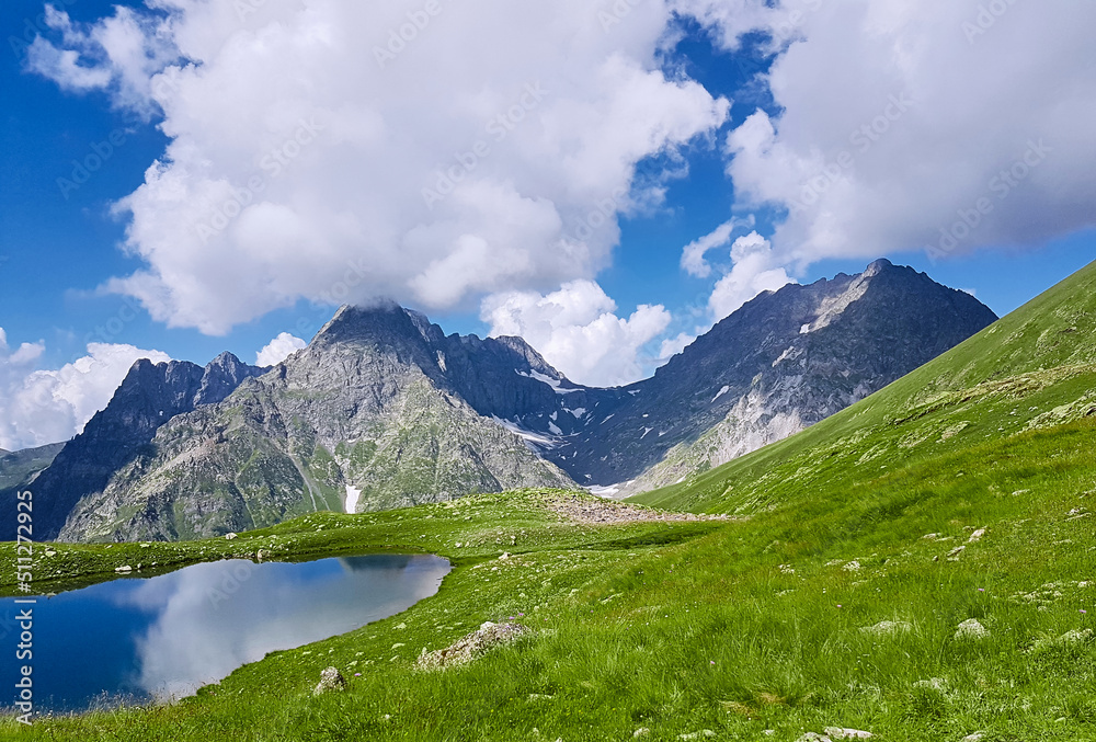 Green grass background, Siniokoe mountain lake in Ural mountains, National park. Green grass background, Siniokoe mountain lake in Ural mountains, National park.