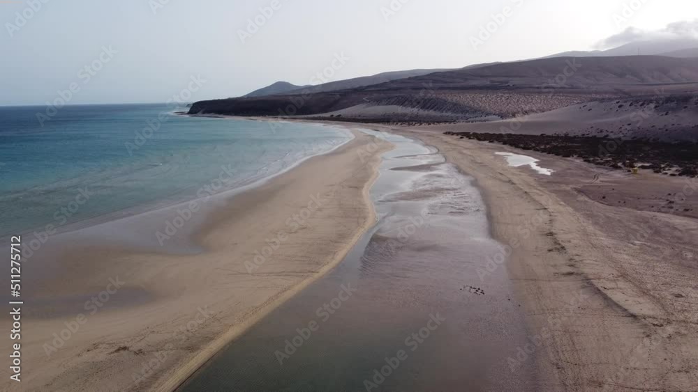 Aerial view of Fuerteventura beach at sunset - Puerto Morro Jable - aerial shot with professional 4k drone Aerial view of Fuerteventura beach at sunset - Puerto Morro Jable - aerial shot with professional 4k drone
