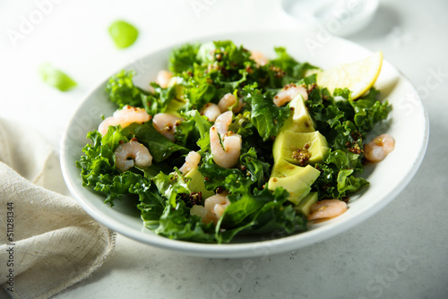 Healthy kale salad with shrimps photo