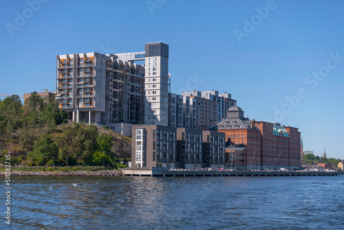 The apartment houses at the pier Kvarnholmen in the district Nacka a sunny summer day in Stockholm 