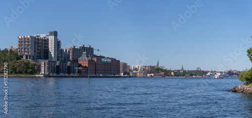 The apartment houses at the pier Kvarnholmen in the district Nacka a sunny summer day in Stockholm   © Hans Baath