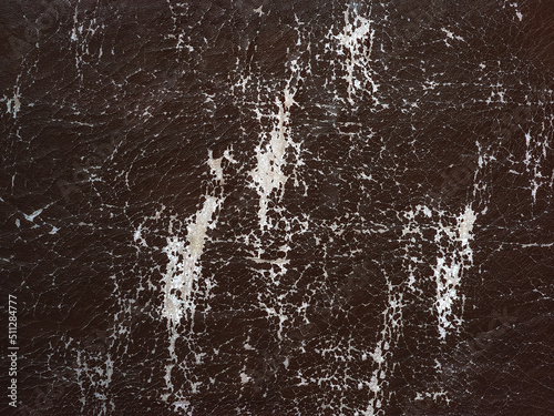 old brown peeling faux leather as vintage background
