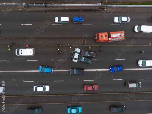 Severe accident. Traffic accidents on the road. View from above. The car got into an accident. Traffic jam.