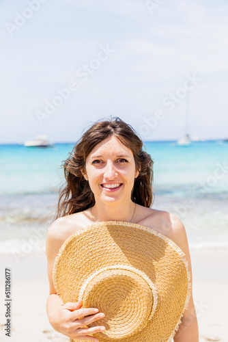 portrait of young white girl with brown hair on the beach