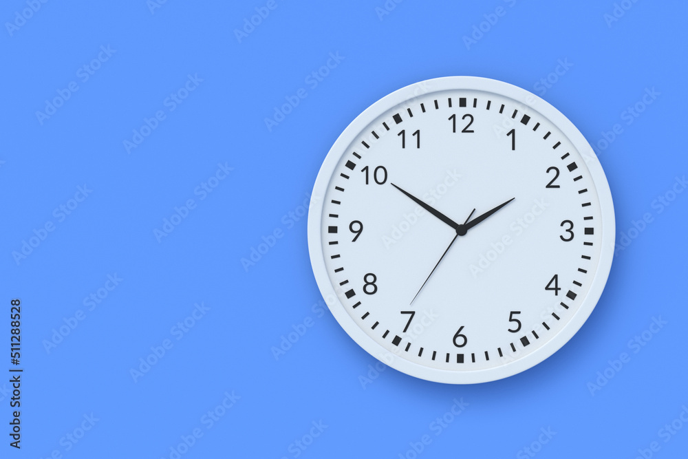 Stylish wall clock on blue background. Time management. Coffee break. Home accessories. Top view. Copy space. 3d render Stylish wall clock on blue background. Time management. Coffee break. Home accessories. Top view. Copy space. 3d render