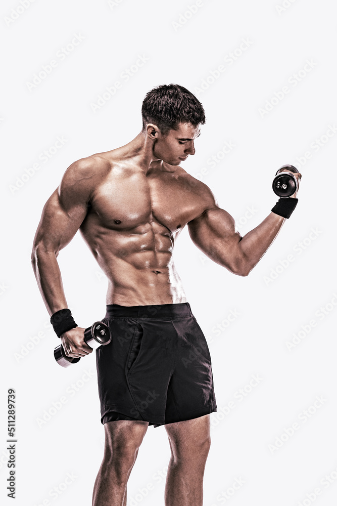 Man athlete with dumbbells isolated on white background. Gym full body  workout. Muscular man athlete in fitness gym have havy workout. Sports  trainer on trainging. Fitness motivation. Stock Photo