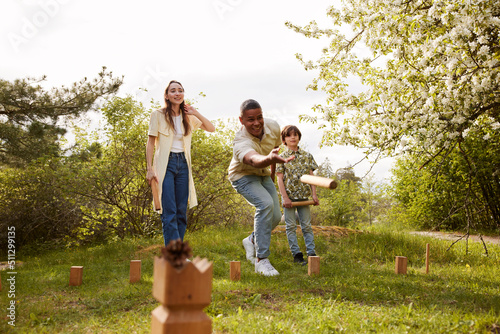 People playing molkky outdoors photo