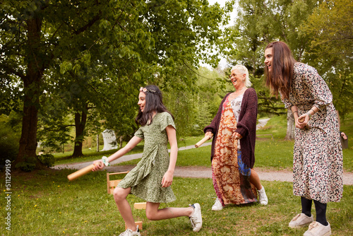 People playing molkky outdoors photo