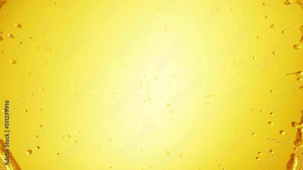 Text face printed on the wet glass blown off with air stream on yellow background | face moisturizer ad Text face printed on the wet glass blown off with air stream on yellow background | face moisturizer ad
