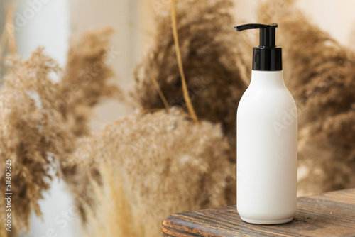  Organic beauty product dispenser mockup on wooden tabletop. Friendly product.