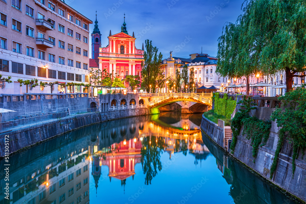 Ljubljana, Slovenia. Cathedral and Triple Bridge , twilight blue hour