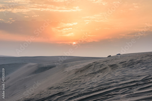 Sunset over Sealine sand dunes  Qatar  Middle East