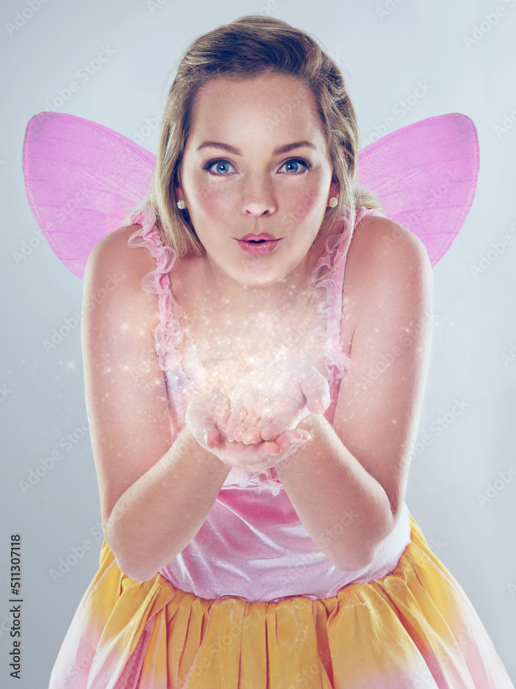 Anything is possible. A cropped shot of a cute fairy dressed in pink. Anything is possible. A cropped shot of a cute fairy dressed in pink.