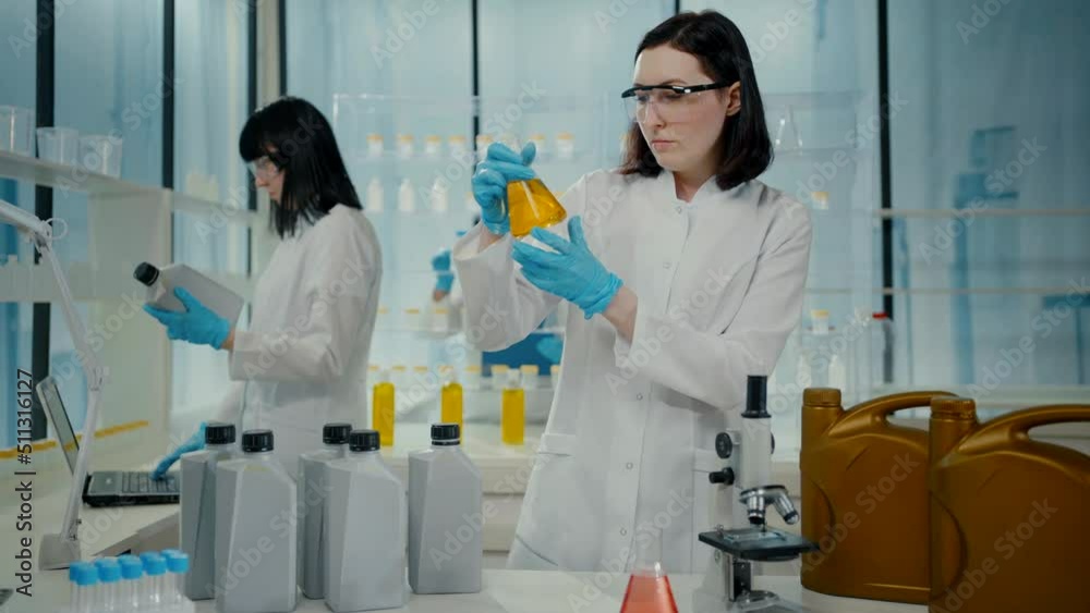 scientists in the modern laboratory oil research and testing general view