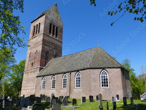 Vaste Burchtkerk church and cemetery in (Dutch) Wikel (Frisian) Wijckel, Friesland, The Netherlands photo