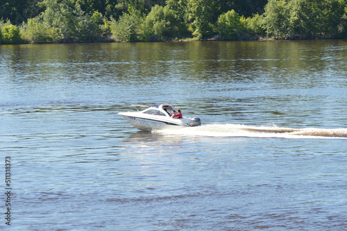 A motor boat on the river