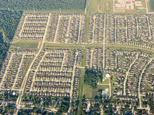 Aerial views of suburbs, interchanges and waterways of Houston Texas photo