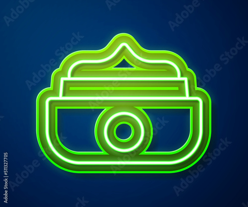 Glowing neon line Gel or wax for hair styling icon isolated on blue background. Hair cosmetic. Jar with product for styling hair and mustache. Vector