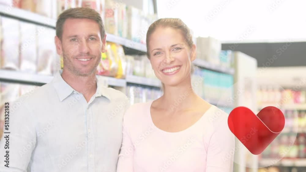 Animation of falling heart icons over caucasian couple in the store Animation of falling heart icons over caucasian couple in the store
