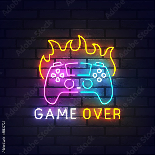 Game Over neon sign, bright signboard, light banner. Game joystick on fire. Game Over logo neon, emblem. Vector illustration