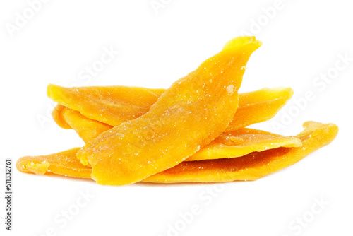 Dehydrated mango on a white background, orange dry exotic fruit.