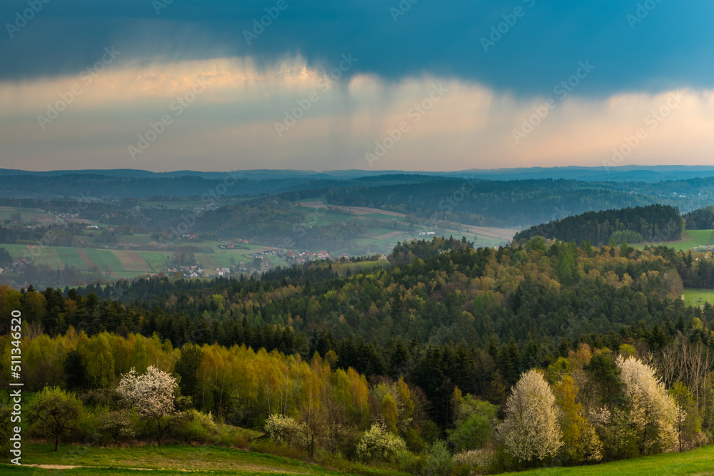 Dark Clouds over Green Lush Rolling Hills in Polish Countryside