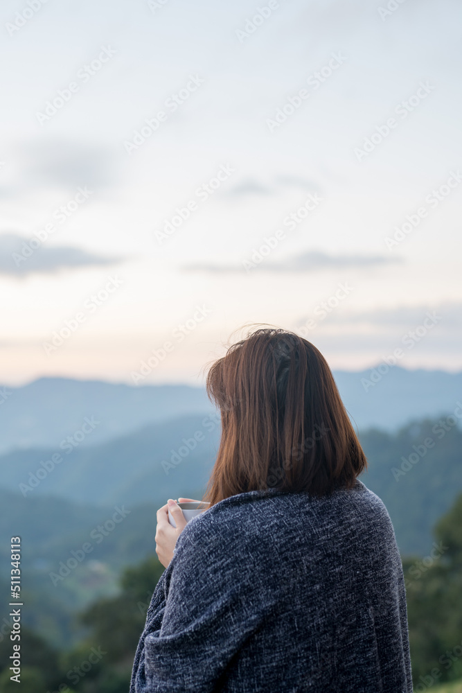 solo woman drink coffee with relax and wellbeing feel with mountain background solo woman drink coffee with relax and wellbeing feel with mountain background